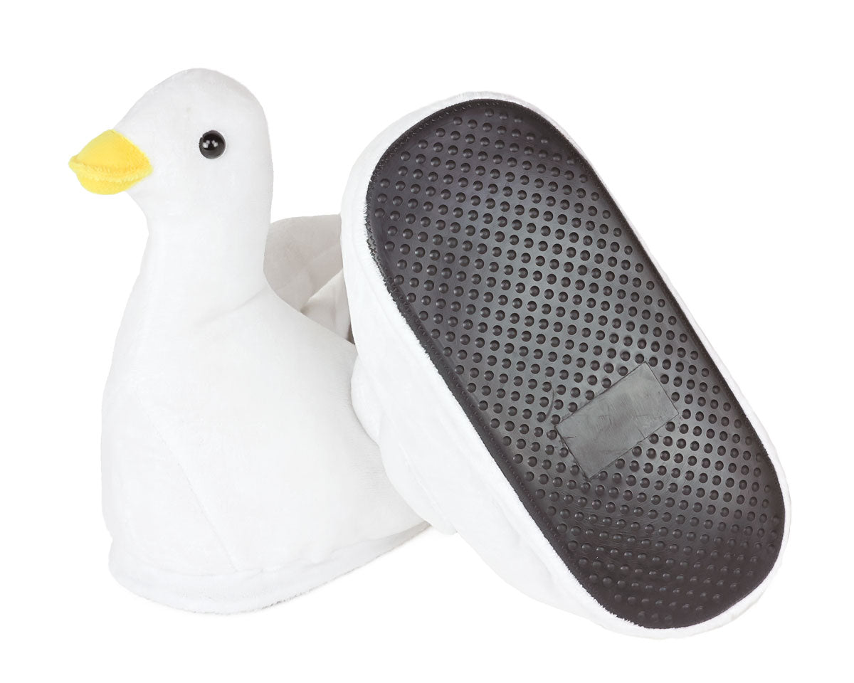Pair of white goose-shaped slippers; one is flipped upside down to show the molded rubber sole with non-slip grips