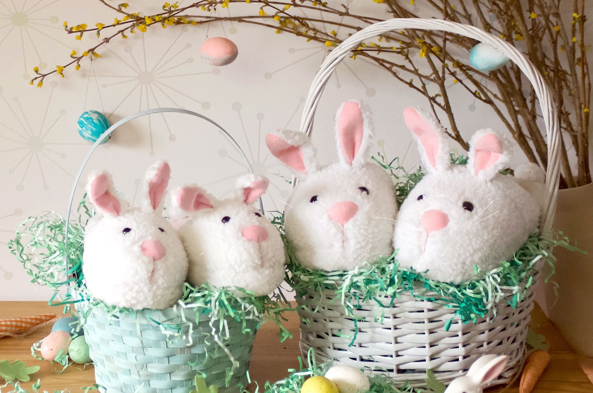Two easter baskets with bunny slippers