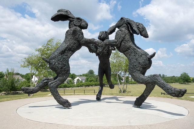 Hop Art: Dancing Hares, A Bronze Sculpture Featuring 3 Giant Rabbits
