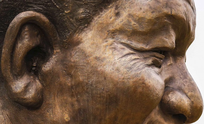 Honoring the Greats: Why Is There a Tiny Bunny in Nelson Mandela's Ear?