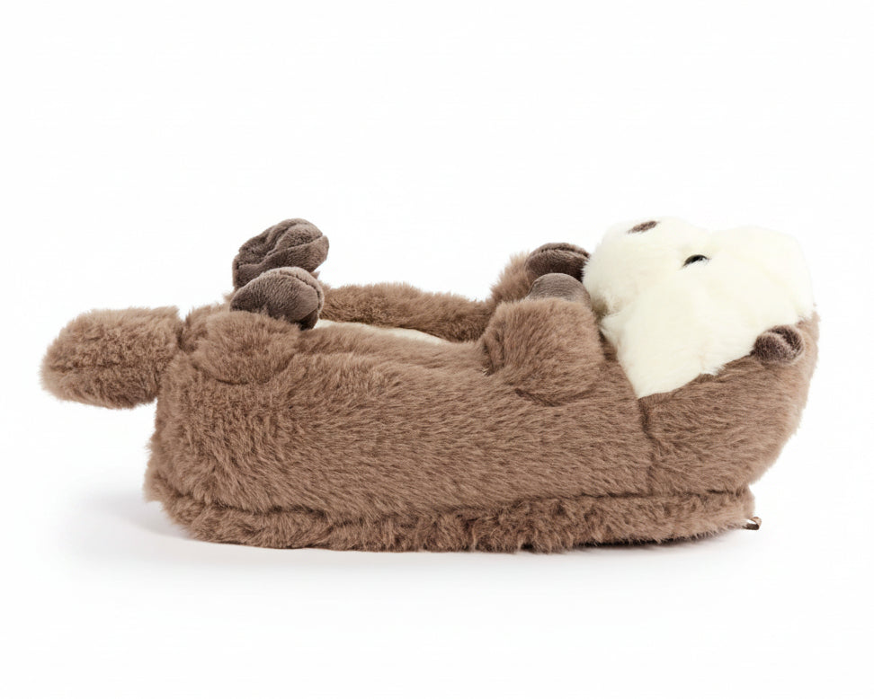 A plush slipper shaped like an otter, featuring a brown furry body, white face, and dark brown paws, shown on a plain white background.