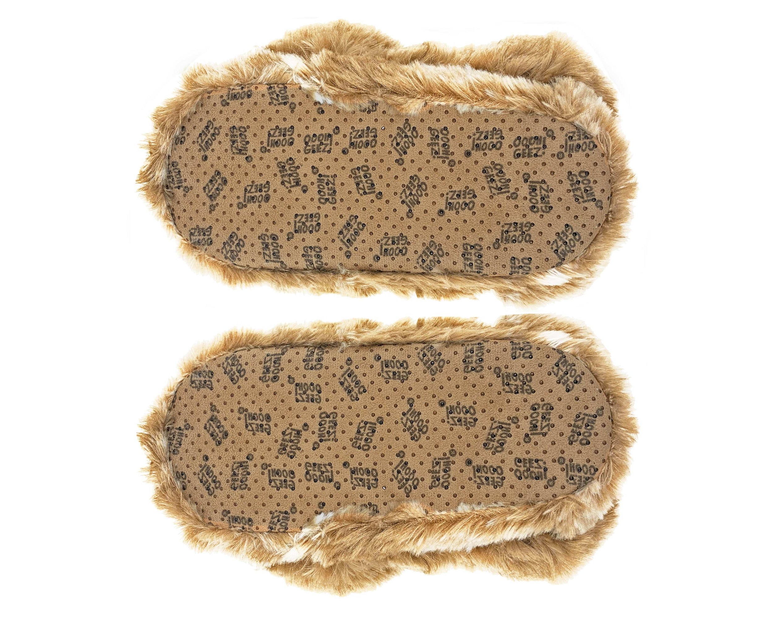 A pair of tan slipper soles with non-slip grips shown on a plain white background.