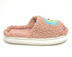 A single pink fuzzy slipper with a small embroidered cartoon face on the toe area, shown against a plain white background.