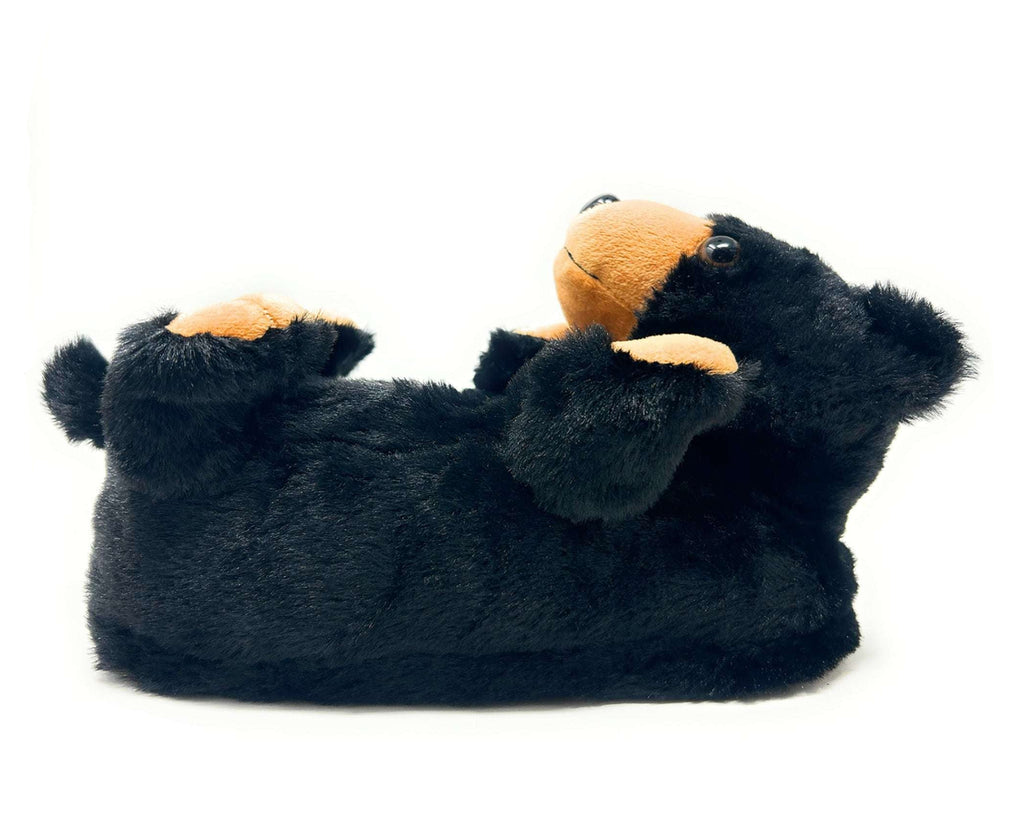 Black plush bear slipper with brown accents on a white background