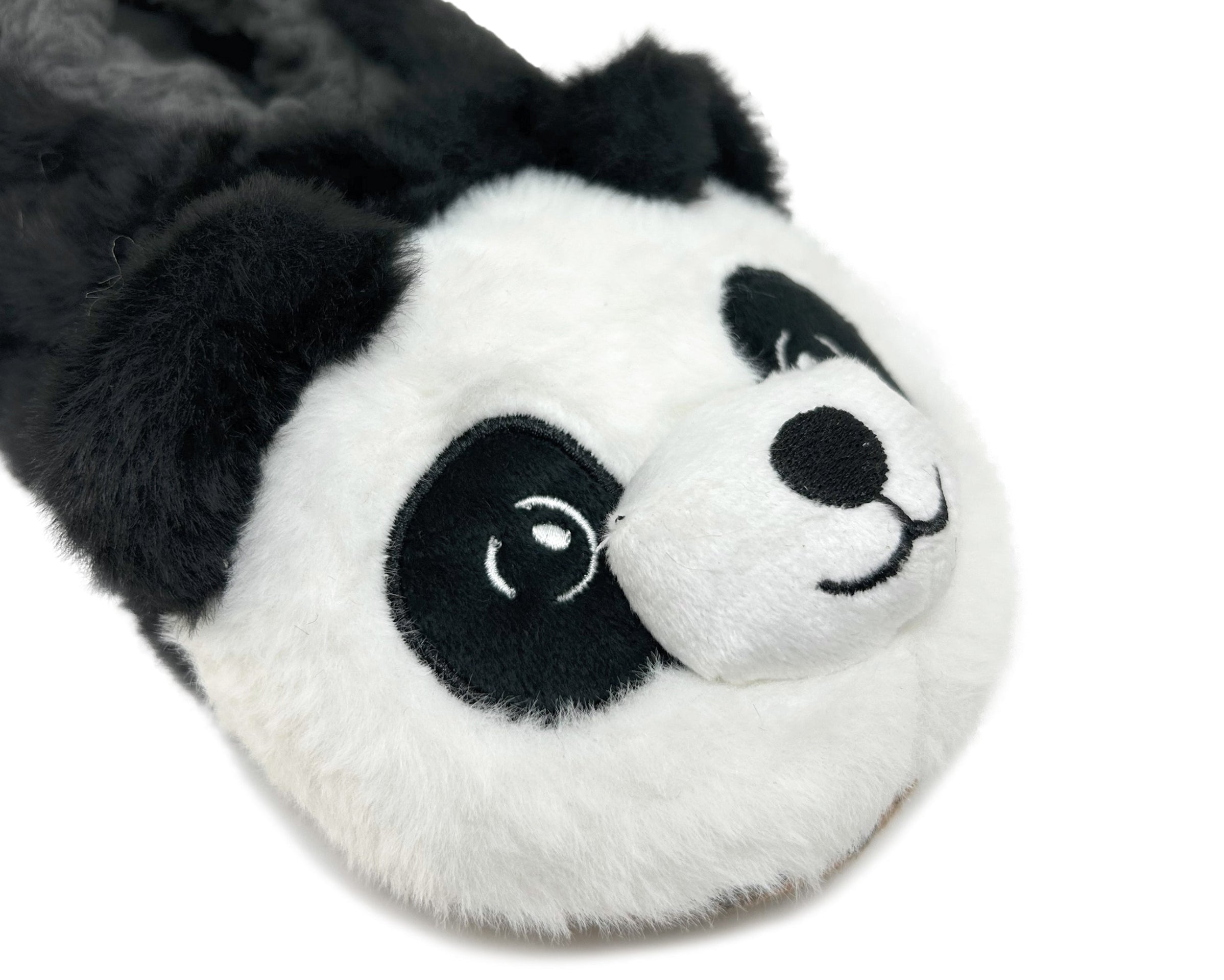 Plush panda slipper on a white background
