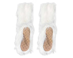 A pair of fluffy white faux-fur slippers with tan non-slip footbeds, shown from a top-down view on a white background.