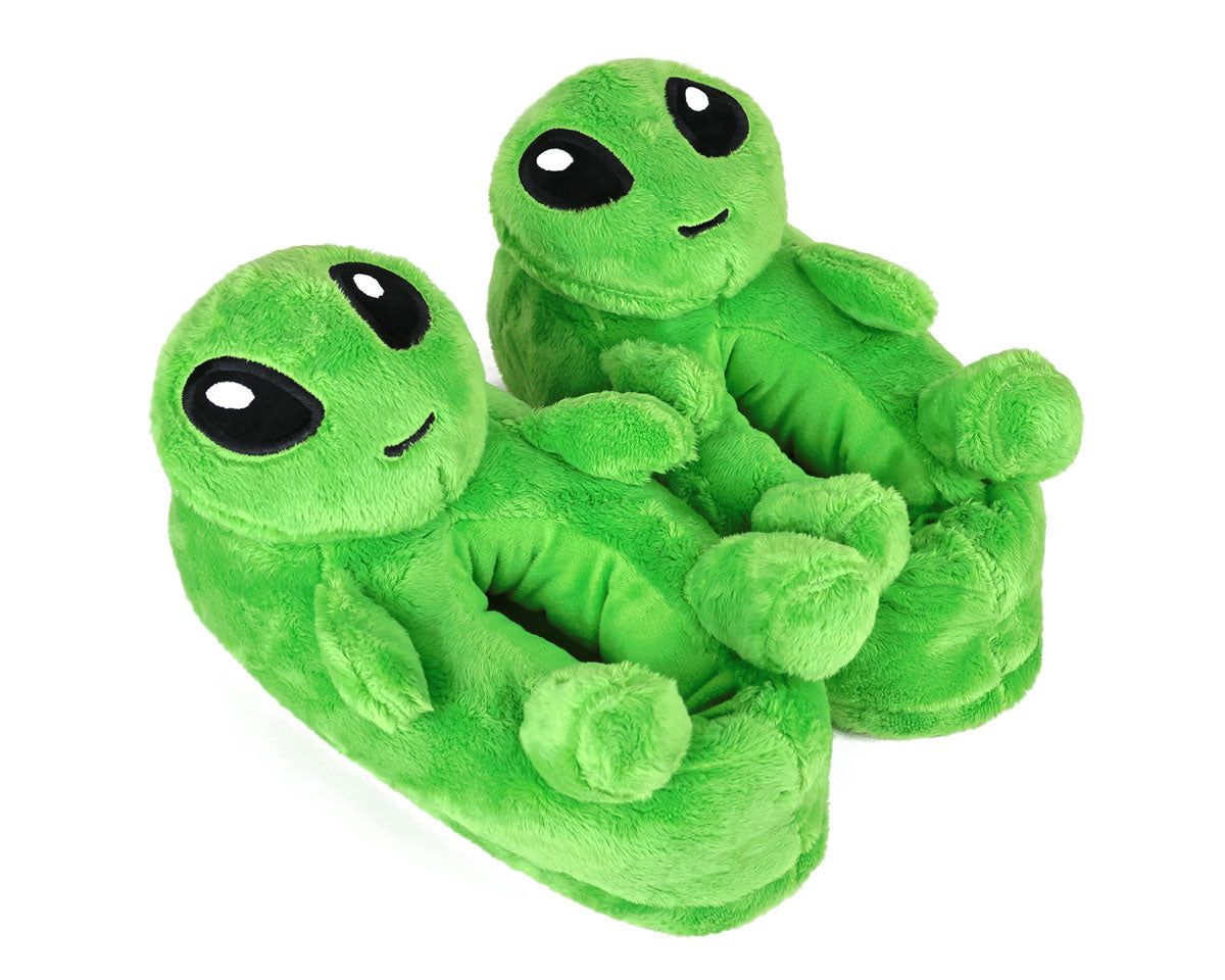 Green alien plush slippers on a white background