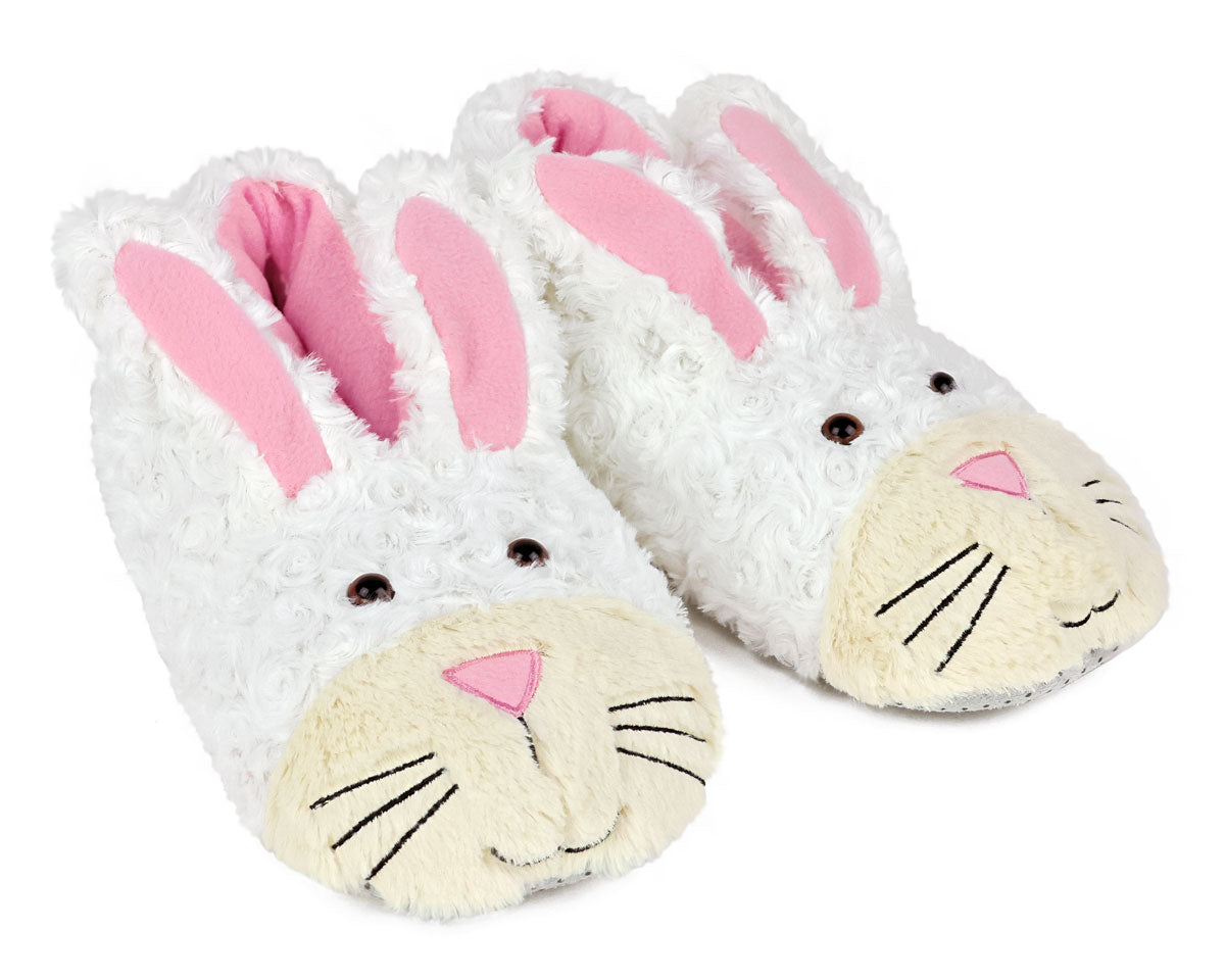 Pair of white bunny slippers with pink ears on a white background