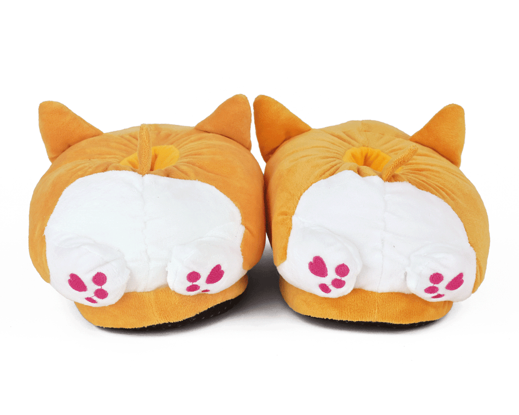 Pair of corgi-shaped slippers seen from the back, showing pink paw pads and white butts
