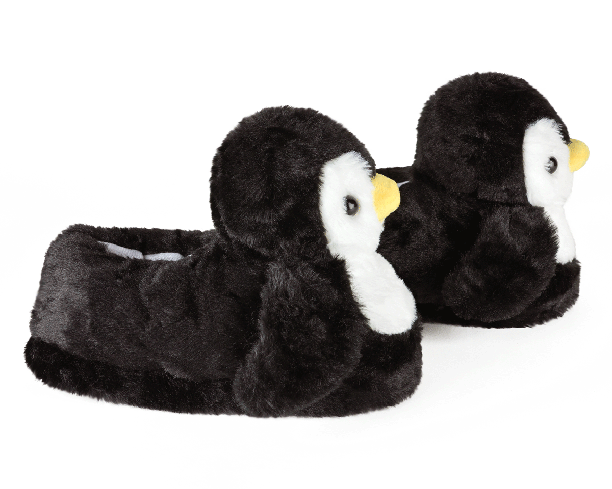 Penguin-shaped slippers on a white background