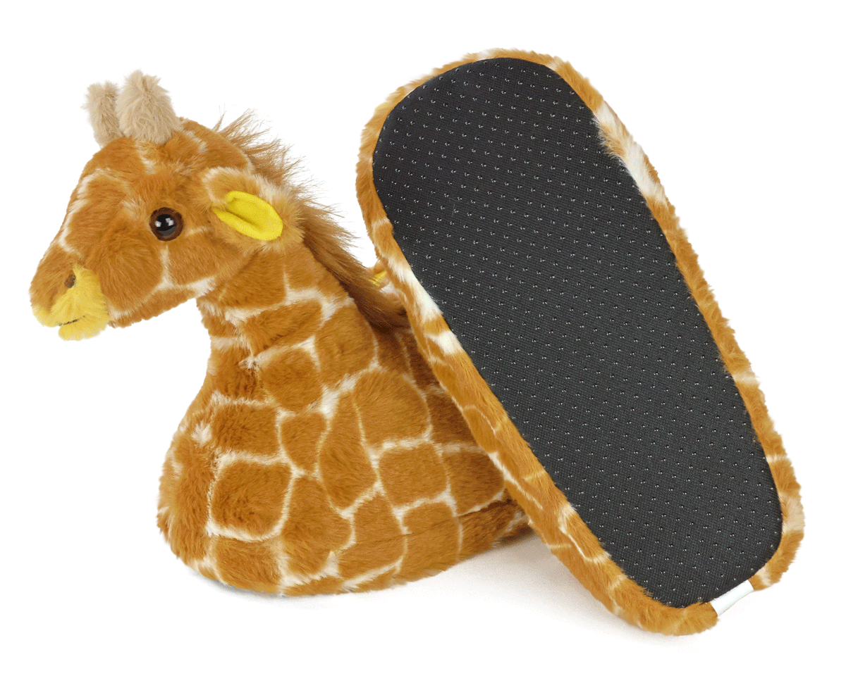 Pair of plush giraffe slippers with one turned upside down to show its black fabric sole with non-slip grips.