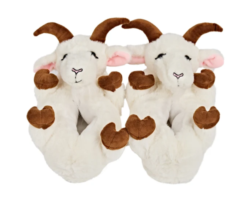 Pair of plush goat slippers seen from above