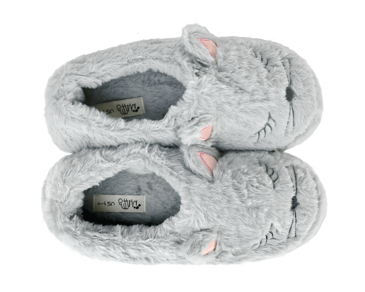 Pair of gray fluffy slippers with cat ears and embroidered faces on a white background