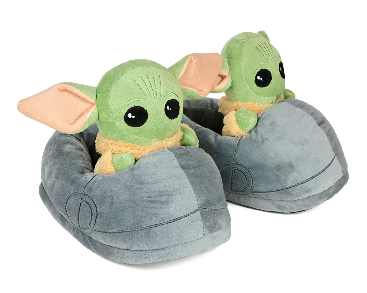 Plush slippers shaped like the green Grogu character with big ears on a white background