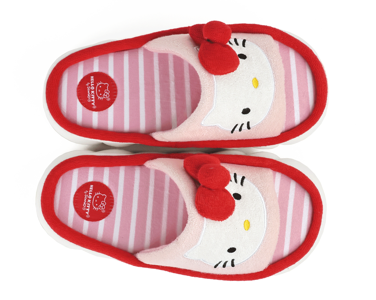 Pair of Hello Kitty slippers with red bows on a white background