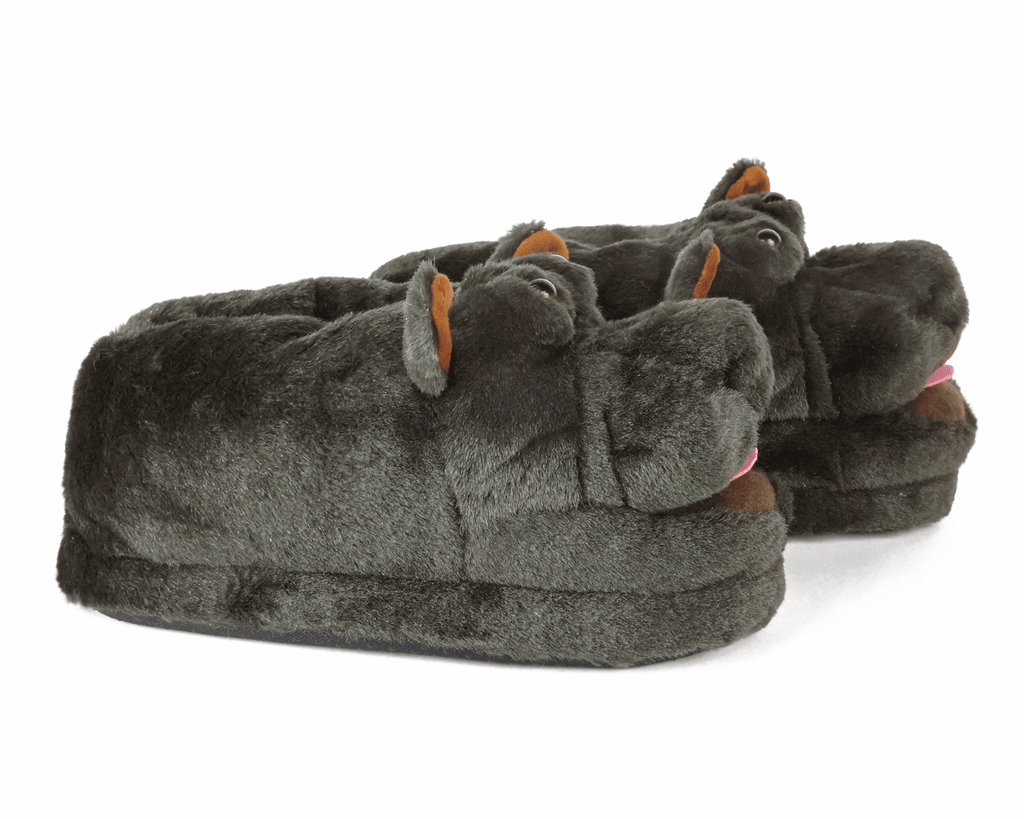 Pair of gray slippers with a hippo design on a white background