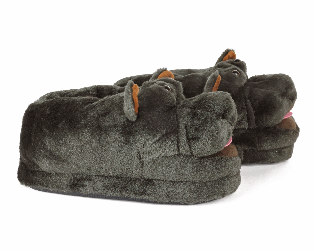 Pair of gray slippers with a hippo design on a white background