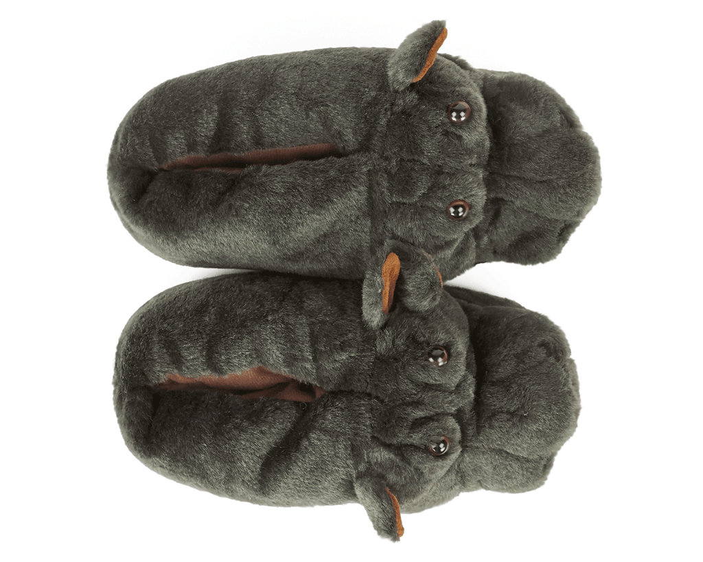 Gray hippo-shaped slippers on a white background