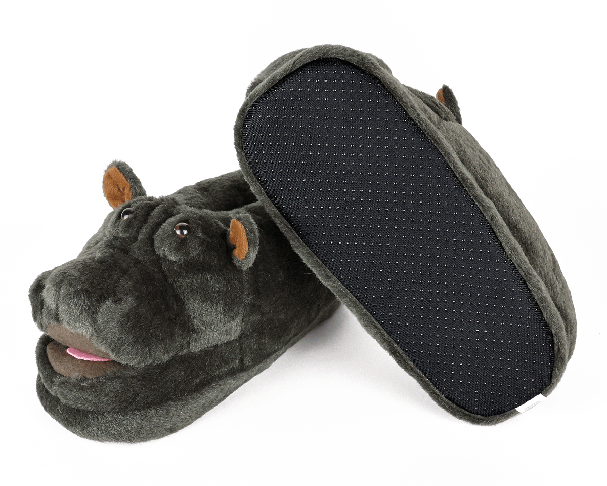 Hippo-shaped slippers on a white background
