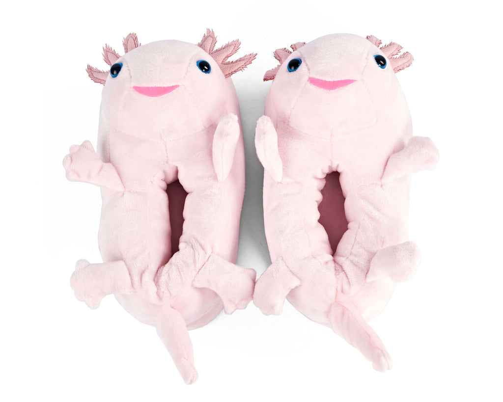Pair of pink plush axolotl slippers seen from above on a white background
