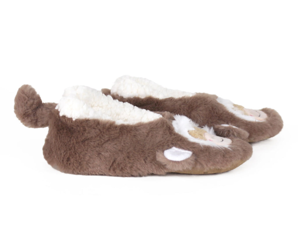 Pair of plush monkey slippers with embroidered faces on the front, ears, and tails on the back, seen from the side on a white background