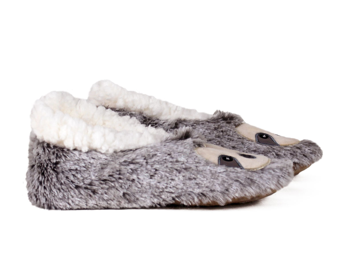 A pair of plush gray slippers designed to look like a sloth, featuring a soft white faux-fur lining and embroidered facial details on the toes, shown against a plain white background.