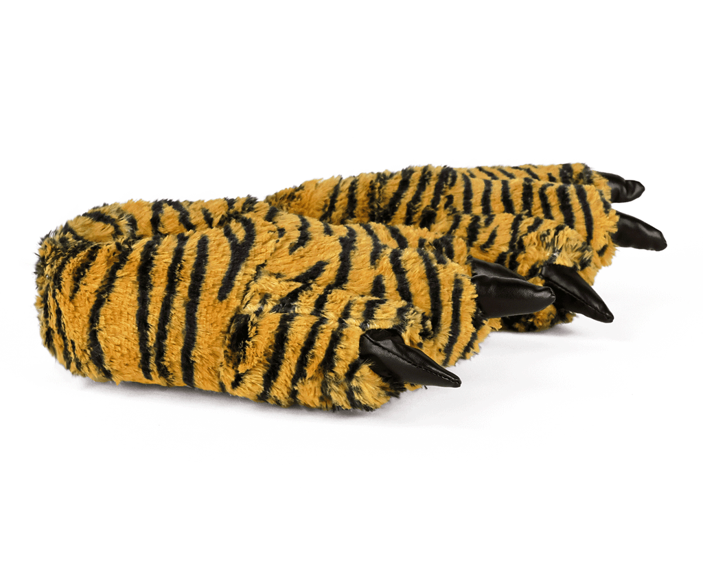 A pair of plush, fuzzy clawed slippers in a yellow and black tiger stripe pattern, photographed on a clean white background.