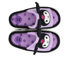 Pair of purple slippers with face of the Sanrio character Kuromi, seen from above to show the purple, skull-patterned fabric footbeds and official Kuromi logo.
