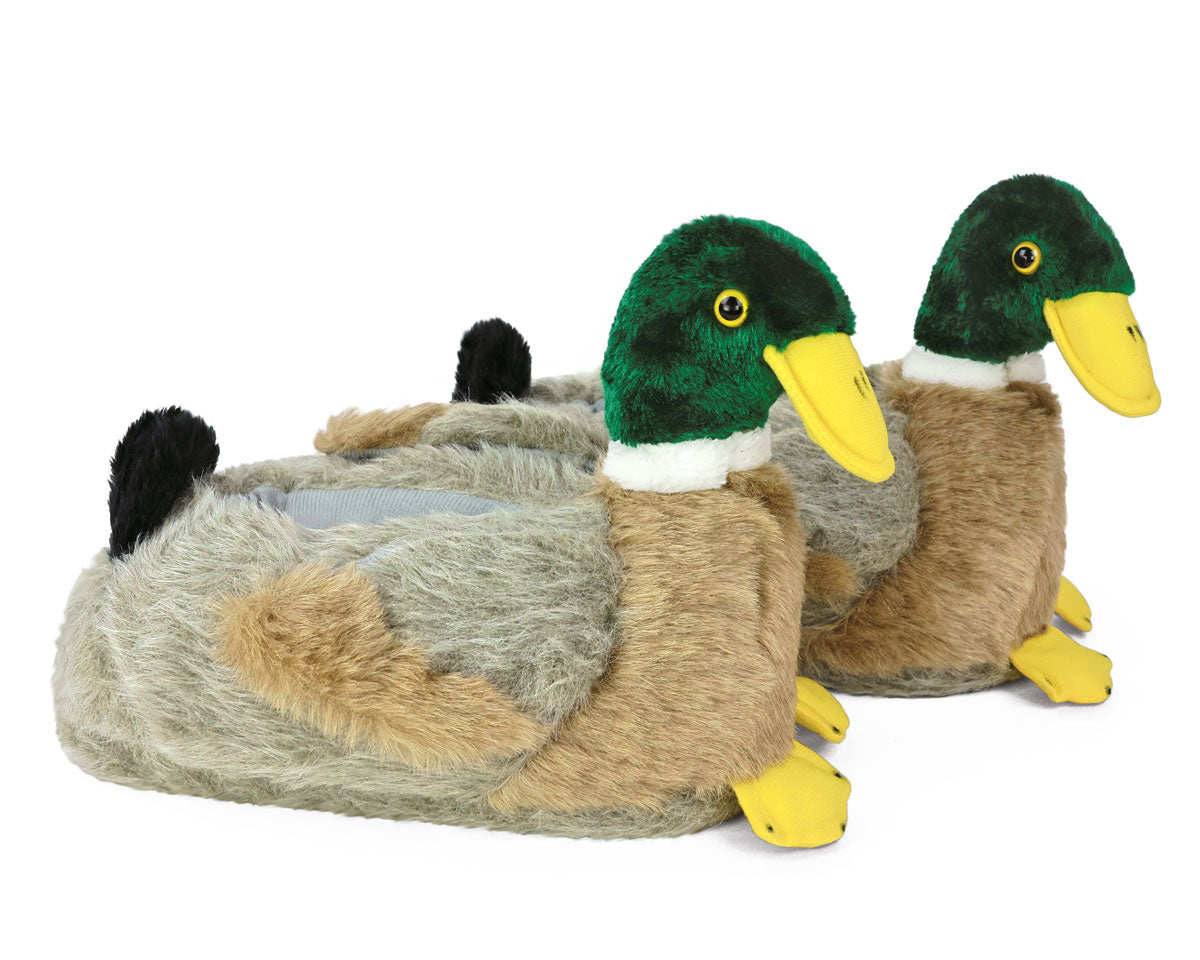 Plush duck slippers with green heads and yellow beaks on a white background