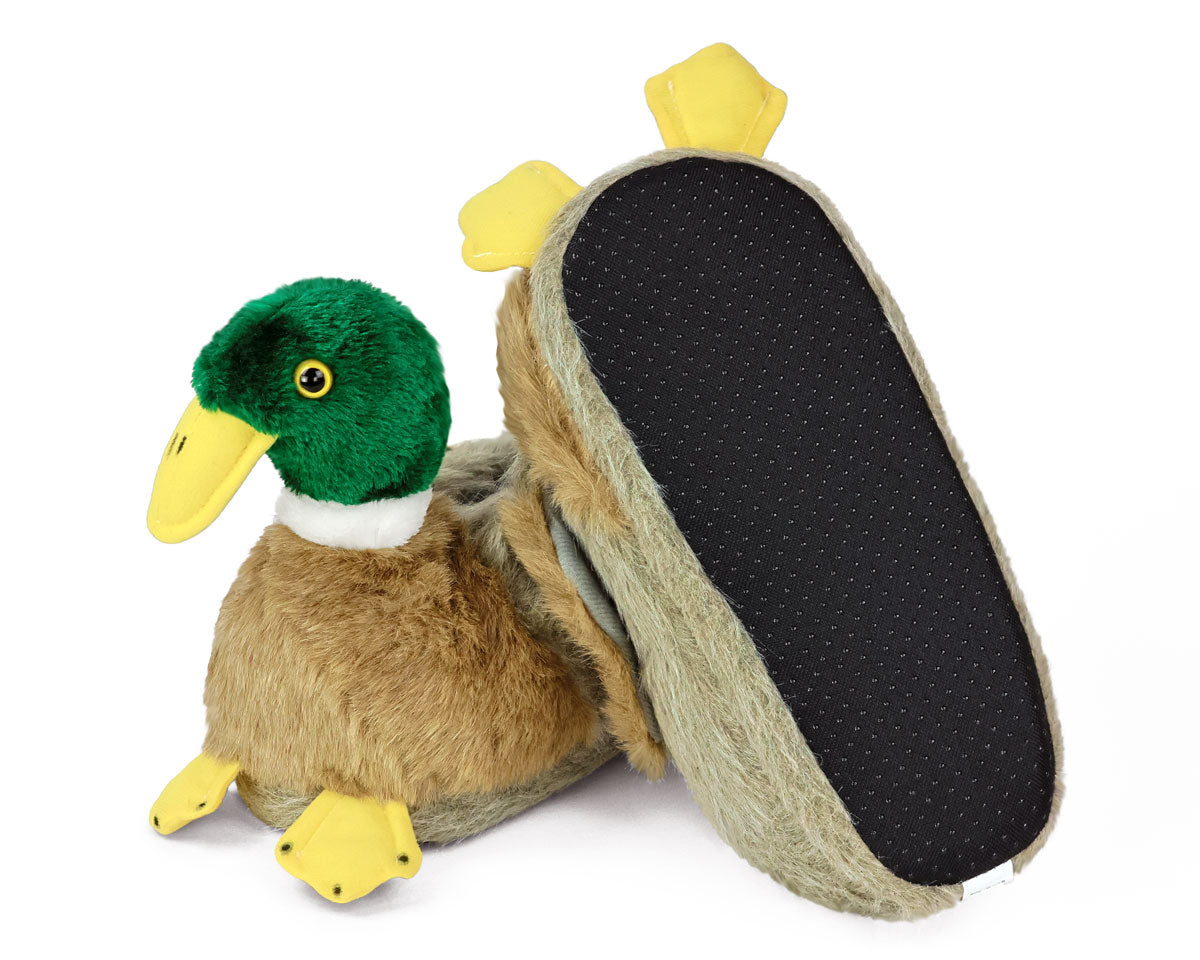 Pair of push duck slippers with one slipper turned upside down to show the textured sole