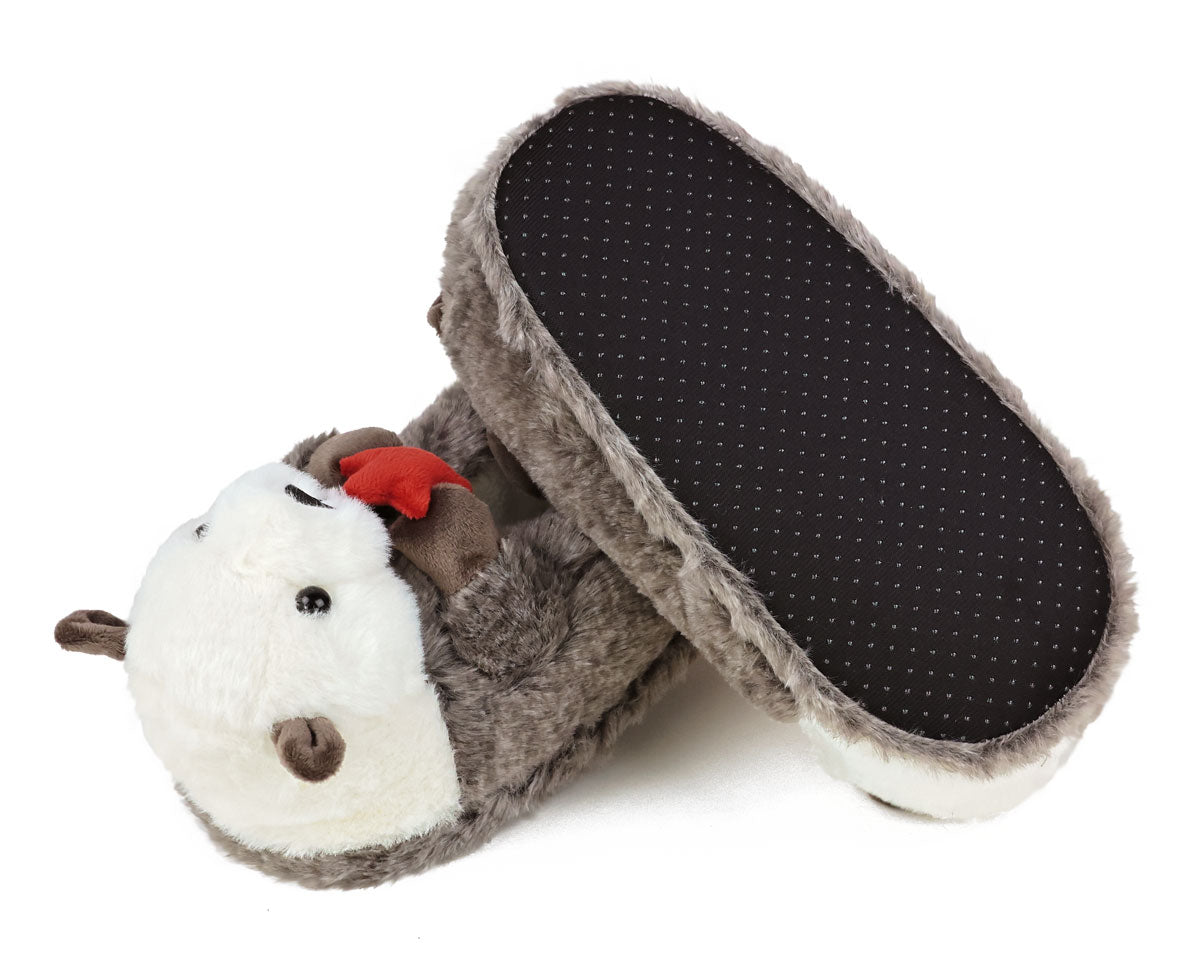 Pair of plush otter slippers with one slipper turned upside-down to show non-slip grips on sole