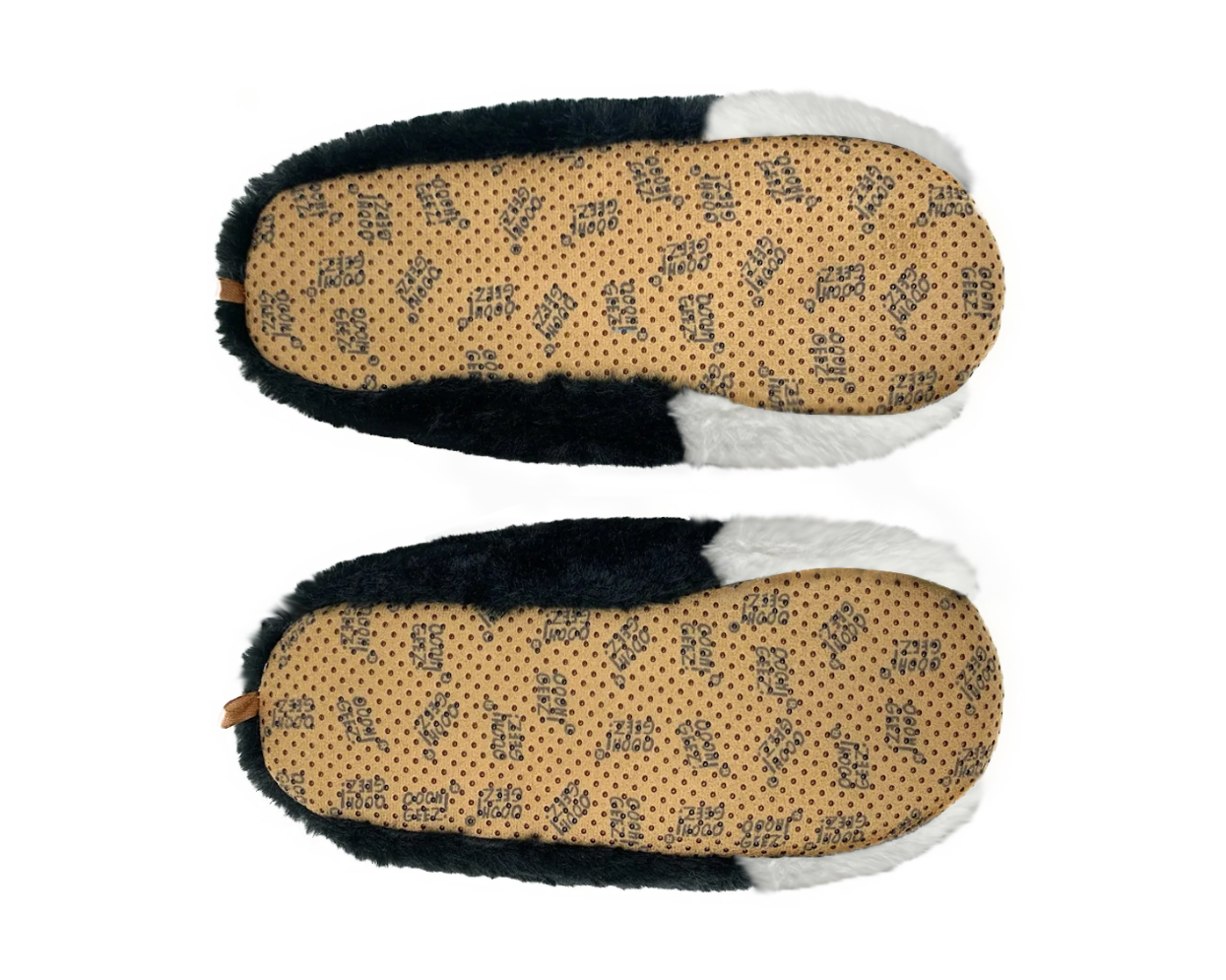 Top-down view of a pair of slippers showing the underside, featuring a tan footbed with a black dotted pattern, black faux-fur trim, and white trim on a white background.