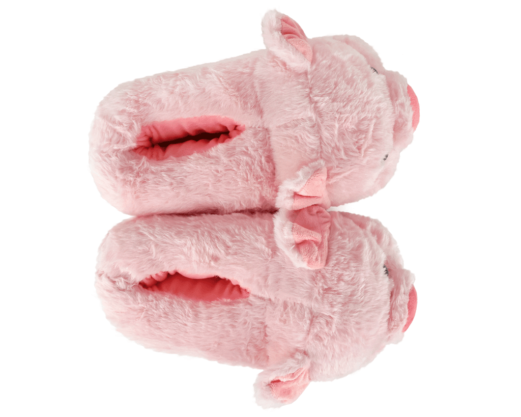 Pair of pink plush pig slippers seen from above, on a white background