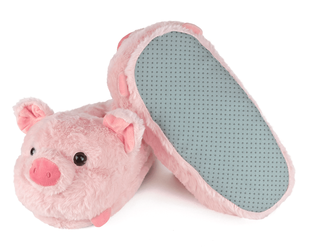 Pair of pink plush pig slippers, one is turned upside down to show a gray fabric sole with non-slip grips