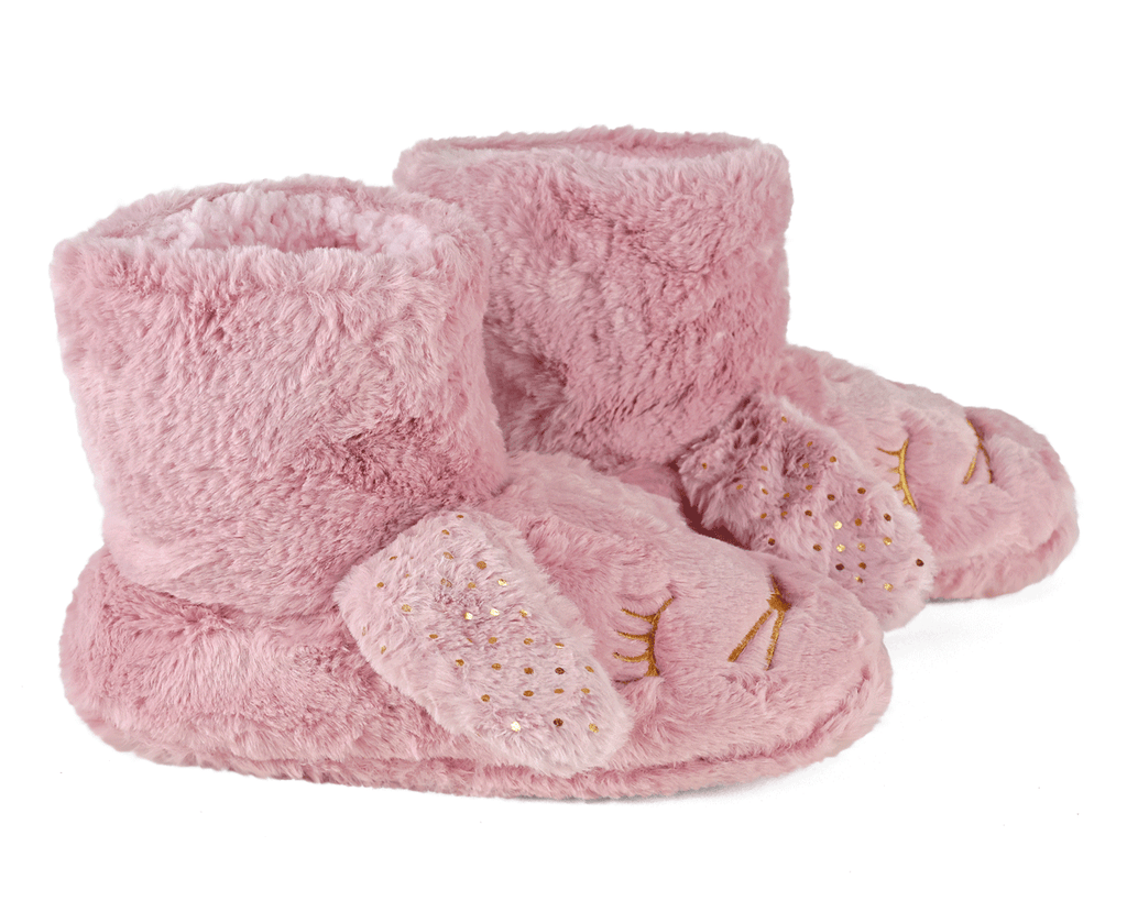 Pair of pink boot style slippers with rabbit face design and ears, seen from the side, on a white background
