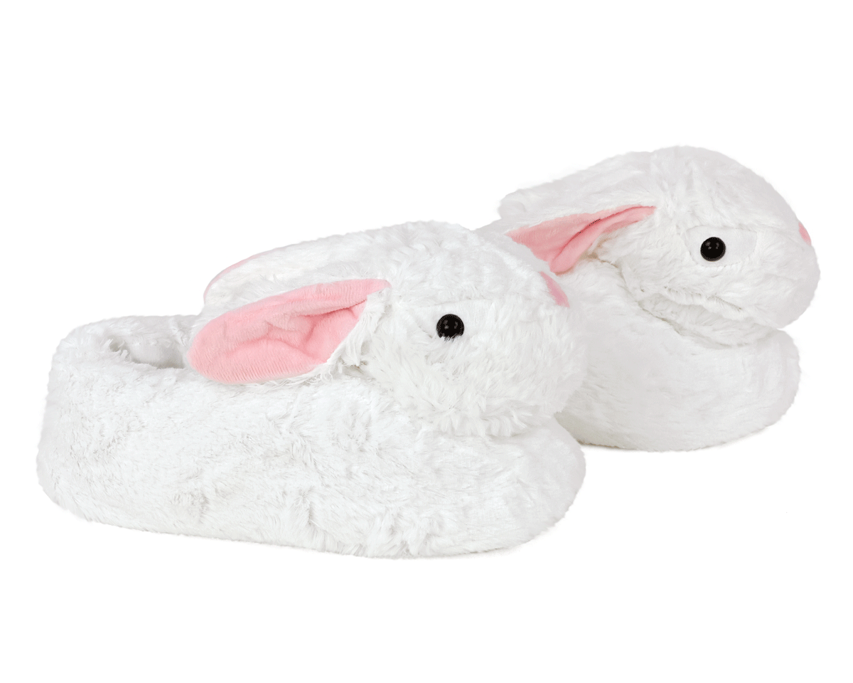 White bunny slippers with pink details on a white background