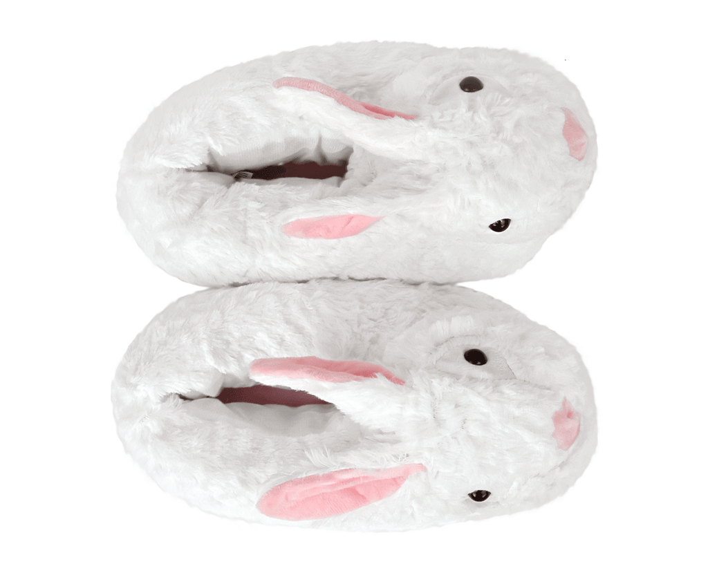Pair of plush bunny slippers on a white background