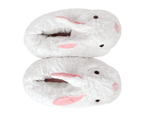 Pair of plush bunny slippers on a white background