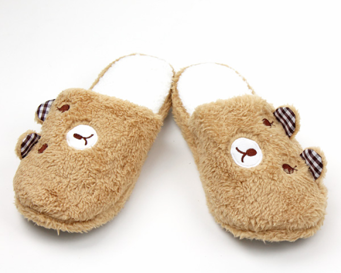 teddy bear with bunny slippers